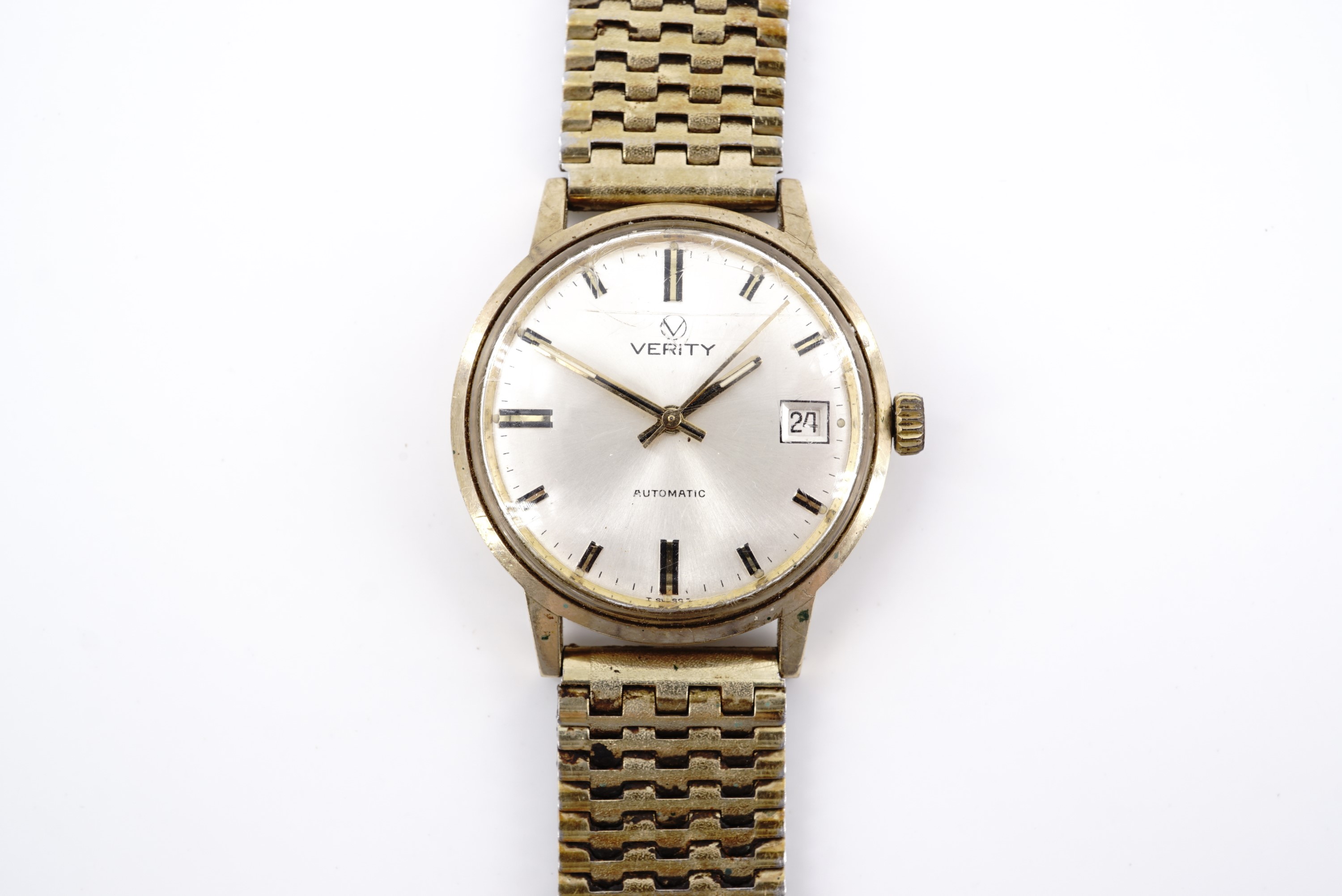 A 1970s Verity 9 ct gold wristwatch, having an automatic movement and radially brushed silver face