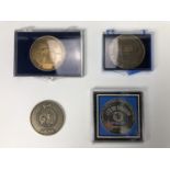 Four Spacelab commemorative medallions