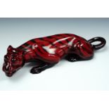 Royal Doulton Flambe Ware tiger, modelled in a crouched and hissing stance, 24 cm