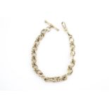A contemporary 9 ct gold watch chain, of cabled annular and plain curb links, with T-bar and swivel,