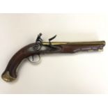 A George III brass-barreled flintlock travelling or holster pistol by Ketland, having a subtly