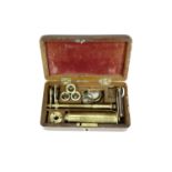 An early 19th Century pocket / field compound monocular microscope, case 16 cm x 10 cm