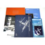 Books and document pertaining to the Russian space station MIR, including a binder of printed