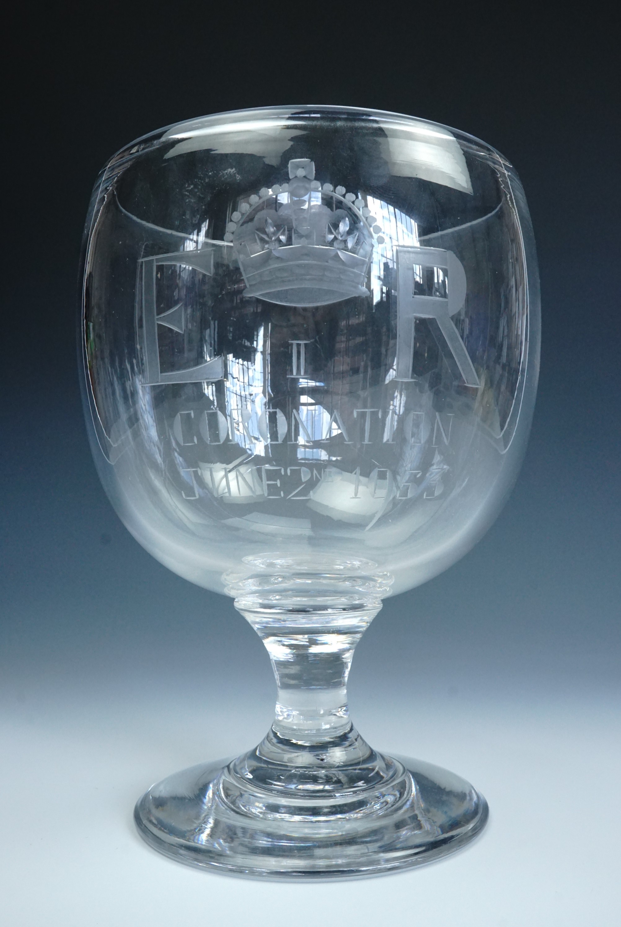 An Elizabeth II Coronation wheel-cut free-blown glass chalice, 21 cm