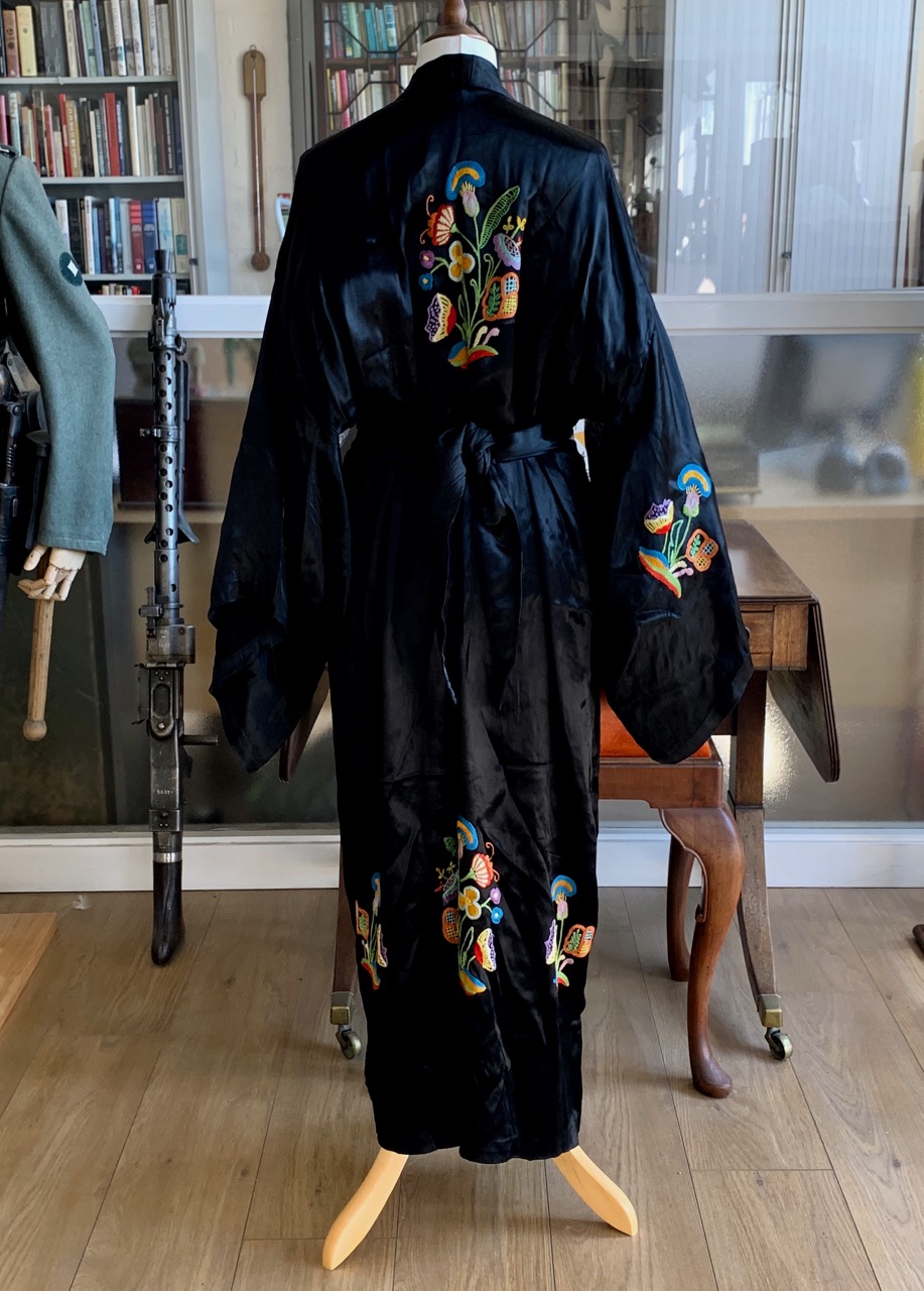 A 1930s black silk kimono, with chain stitch embroidered decoration in the form of jazzy multi- - Image 2 of 2