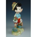 A Beswick figurine of Pinocchio from the Walt Disney Series, 11 cm, free from damage