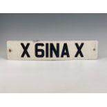 A personal registration / number plate "X GINA X", on retention