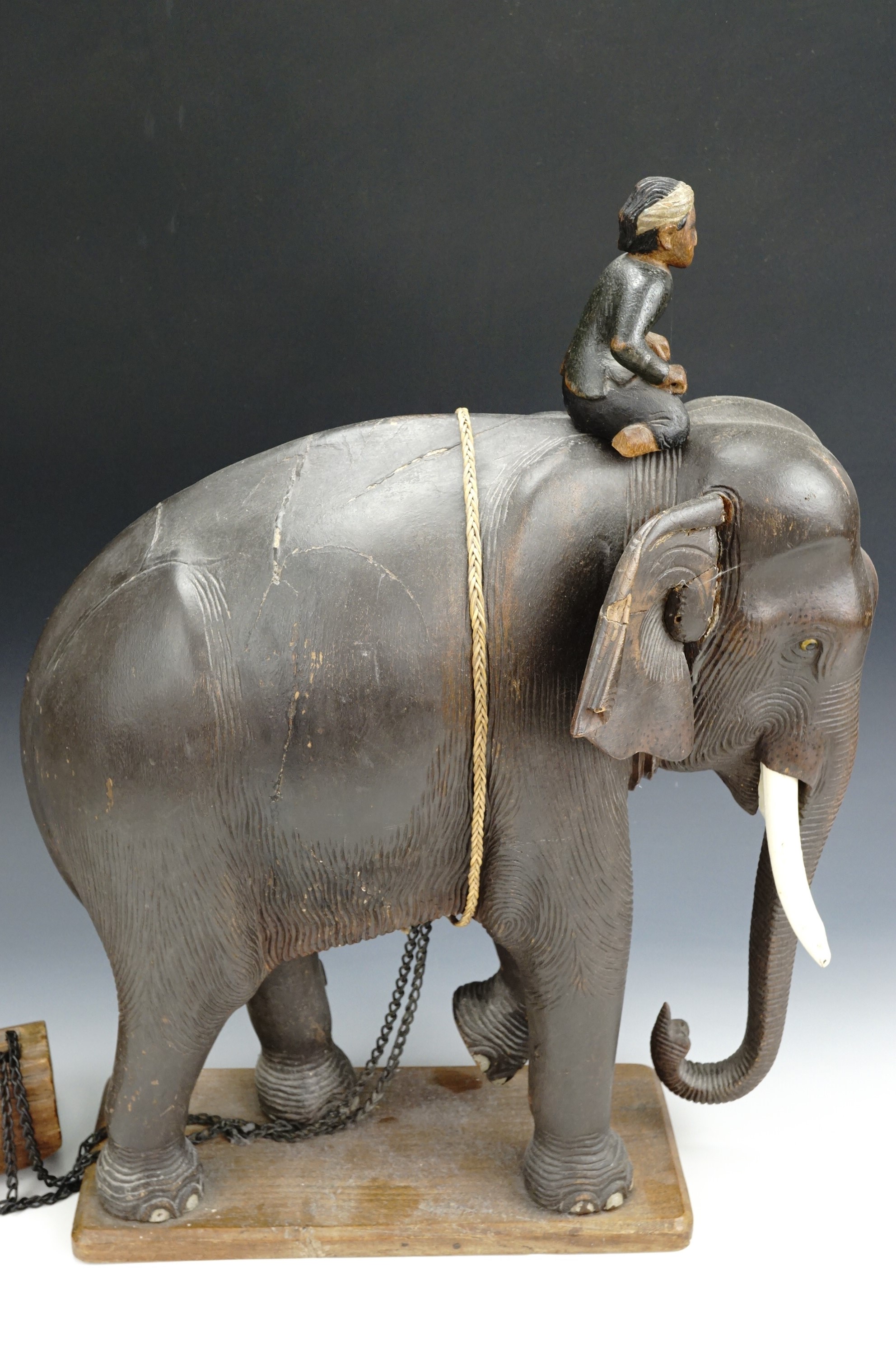 A 1930s Malayan elephant sculpture of carved wood, depicting a naturalistically modelled elephant - Image 5 of 8