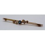 An early 20th Century blue paste and seed pearl bar brooch, stamped 9 ct and tested as gold, 535 cm,