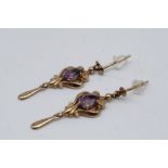 A pair of amethyst and yellow metal ear pendants, 28 mm, 1.7 g