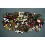 A very large quantity of vintage lapel badges and medallions including pre-War Women's National