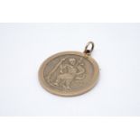 A 1970s 9 ct gold Saint Christopher pendant, the reverse depicting modes of transport including