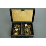 A late 19th / early 20th Century green leather jewellery box containing vintage jewellery