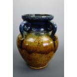 A late 19th / early 20th Century Belgian Arts and Crafts vase, 23 cm
