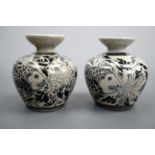 A pair of crackle-glazed and hand-decorated vases, 13 cm