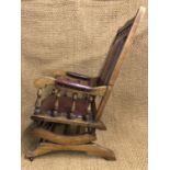 A late 19th Century American sprung rocking chair