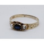 A 19th Century blue topaz and pearl finger ring, having an engraved yellow metal shank, N / O