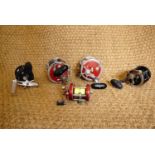 Five sea fishing multiplier reels including a Penn Senator 114HL, Penn 114H special 6 Senator,