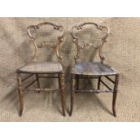 A pair of Victorian cane-seated walnut bedroom chairs