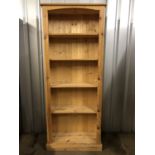 A contemporary reproduction Victorian pine open-fronted four-shelf bookcase, 82 cm x 35 cm x 200 cm