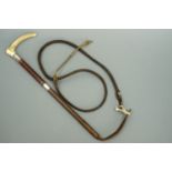 A 1930s antler-handled and silver-collared riding whip