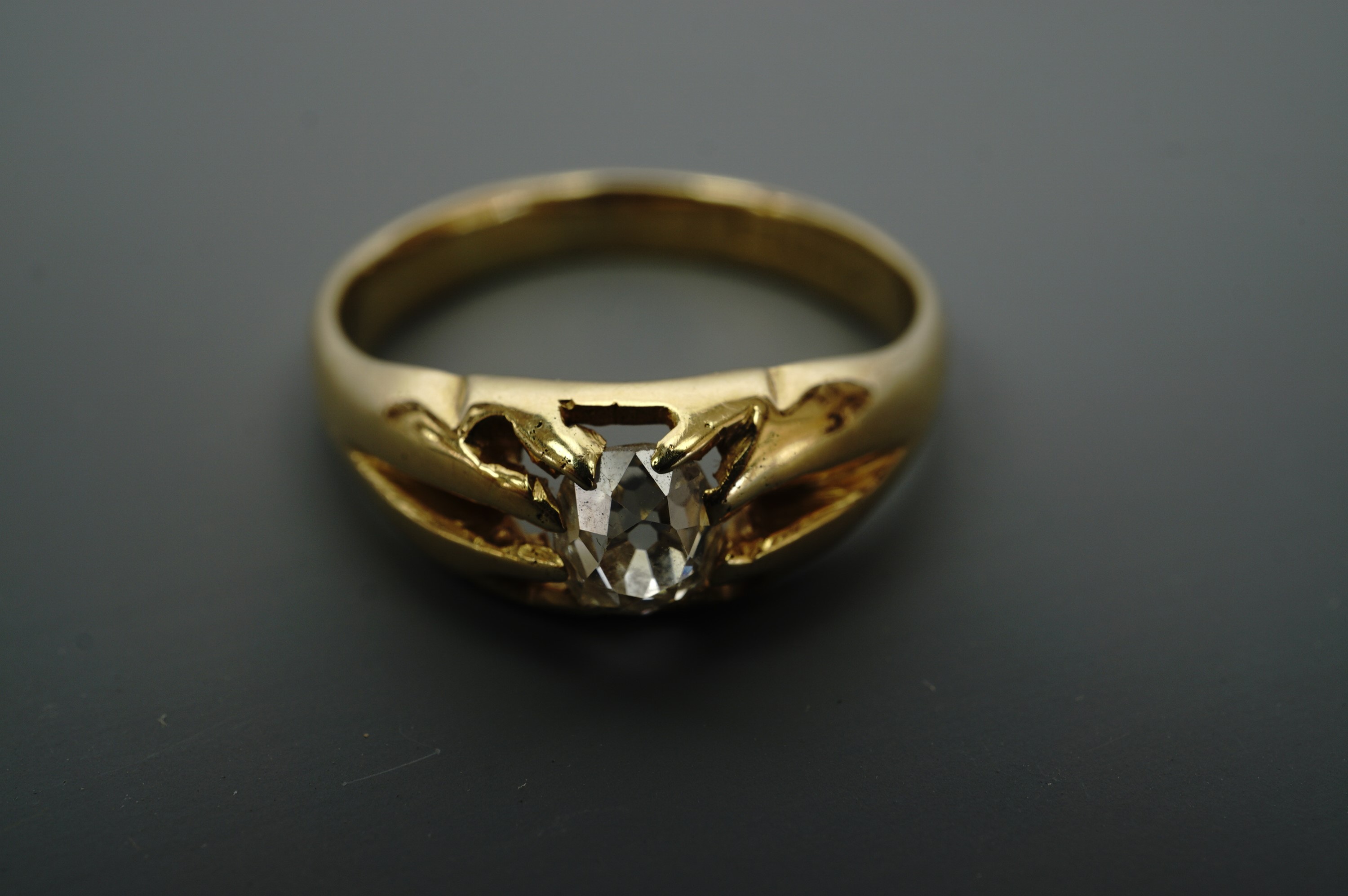 A diamond solitaire ring, the old brilliant cut diamond of approximately 0.5 ct set on a heavy 18 ct - Image 2 of 3