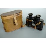 A set of 1920s French style military style binoculars