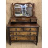 A late Victorian walnut-veneered mahogany bedroom suite