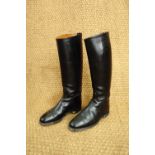 A pair of vintage English made black leather riding boots, size 8.5, (minimal ware)