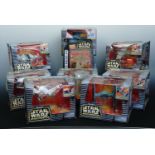 A quantity of vintage boxed Micro Machine Star Wars action fleet toy vehicles