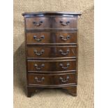 A mahogany serpentine fronted chest, ex-Chapman's, 45 cm x 35 cm x 70