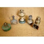 A Victorian oil lamp, a brass marine binnacle compass lamp, a Primus stove etc