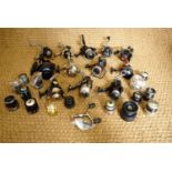 A quantity of fishing reels inc Shimano, Cardinal, Mitchell, and spare spools