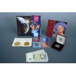 A group of Royal Mint United Kingdom commemorative coins, including Millennium / Year 2000 Five-