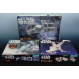 Three AMT Star Wars model making sets including a limited edition B-Wing fighter