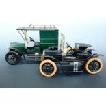 Two vintage tinplate Ford model cars, tallest 20 cm