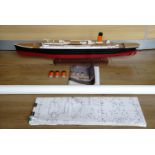 A part-completed wooden scale model of the RMS Titanic, with plans etc, 107 cm