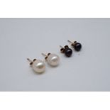 A pair of pearl and yellow metal earrings (backs tested as gold), together with a similar pair of