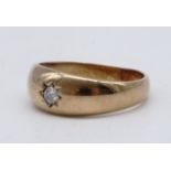 A gypsy set diamond solitaire ring, the 10 point brilliant set in a 9 ct gold shank, X / Y, 6.1 g