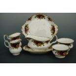 A large quantity of Royal Albert " Old Country Rose " tea and dinnerware, approx sixty pieces, three