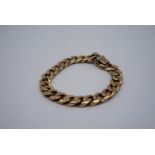 A 9 ct gold faceted curb link bracelet, 44 g