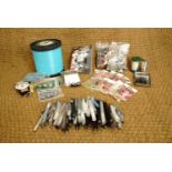 A quantity fishing tackle including flying C-spinners, an LED headlight, a large spool of