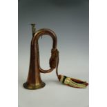 A copper and brass bugle