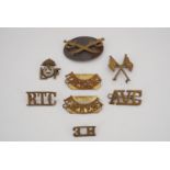Army brass shoulder titles and qualification badges