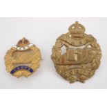 A Tank Corps cap badge and sweetheart brooch