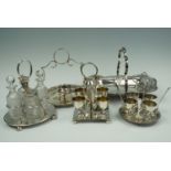 A Mappin and Webb cruet set together with two egg cup sets, basket etc