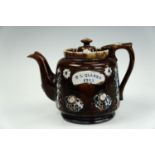 An early 20th Century Measham barge ware teapot, impressed "F.L.Clarke 1913"