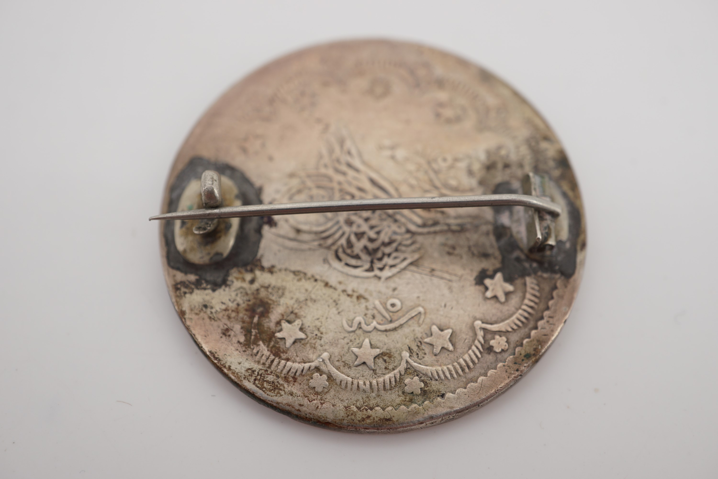 An Ottoman silver coin having had a brooch pin affixed, polished and engraved "No 59334, A C Muddle, - Image 2 of 2