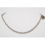 A late 19th / early 20th Century silver graded curb link watch chain, with nickel T-bar and St