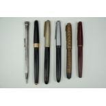 A vintage Parker Vacumatic fountain pen, other fountain pens and an EverSharp white metal propelling